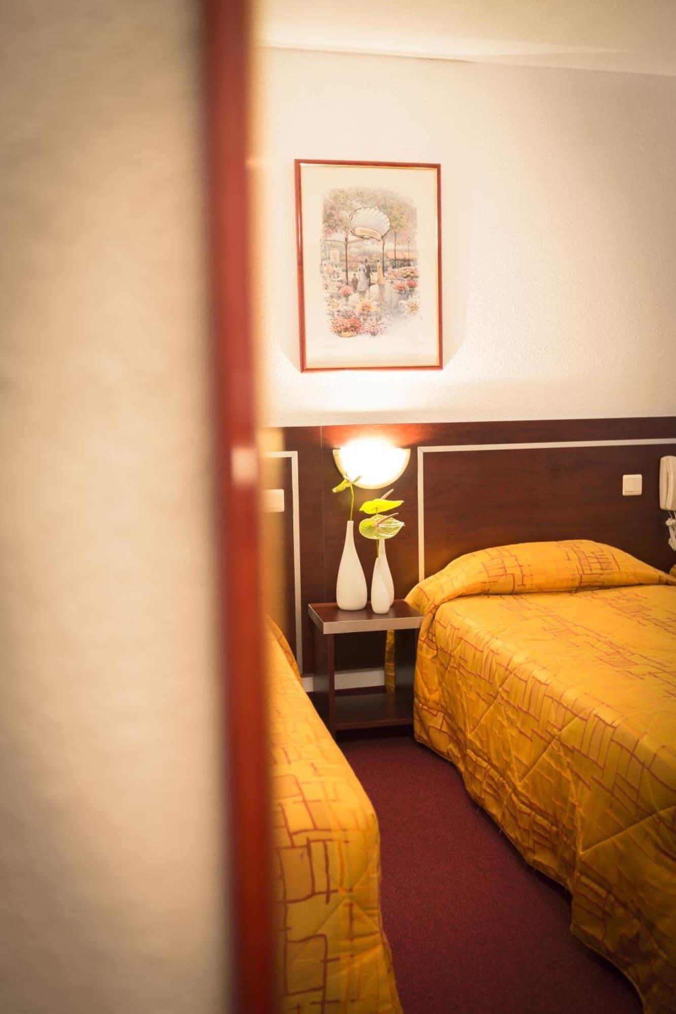 Habitación America Hotel Lourdes