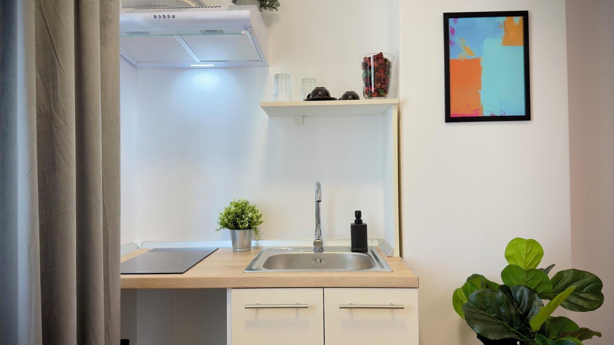 Equipamiento de Habitación Ivory Residence Apartments Modern Style