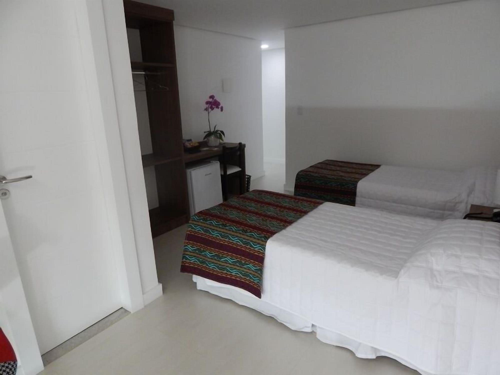 Habitación Gaia Suites Macaé