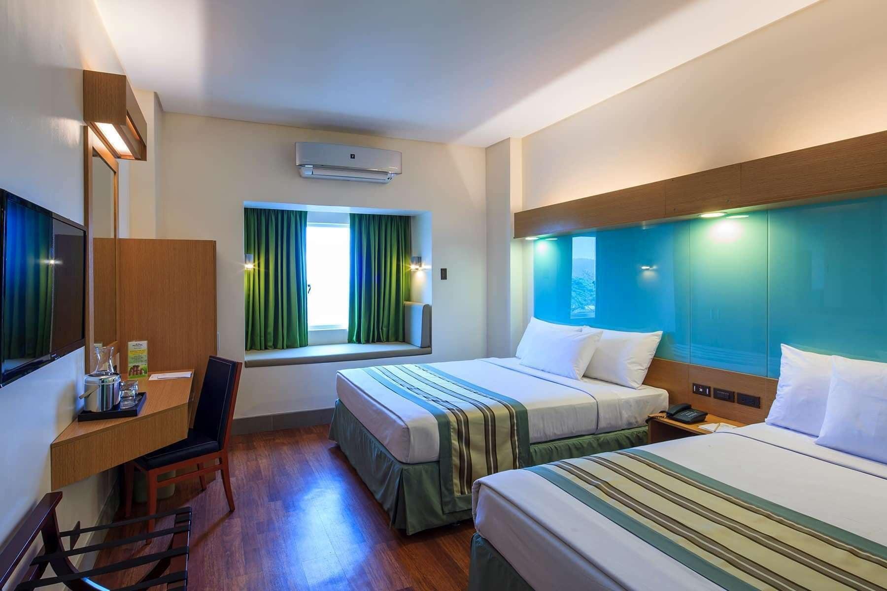 Habitación Microtel by Wyndham South Forbes near Nuvali