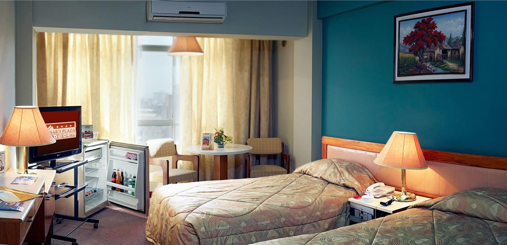 Habitación Cesars Plaza Hotel