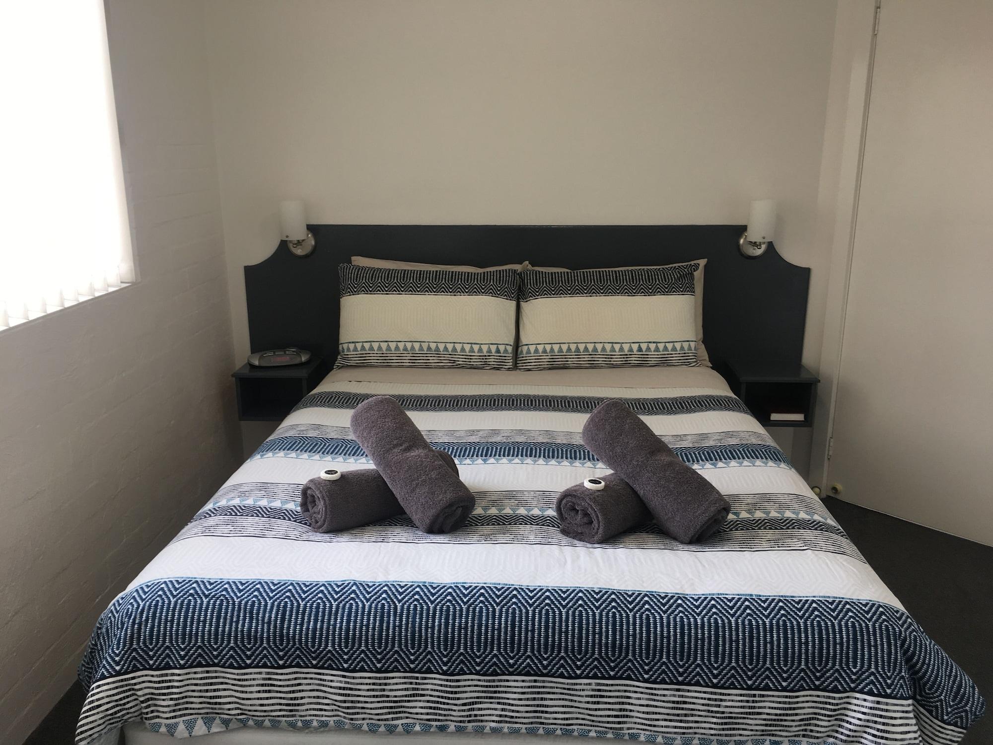 Habitación Crown Apartments