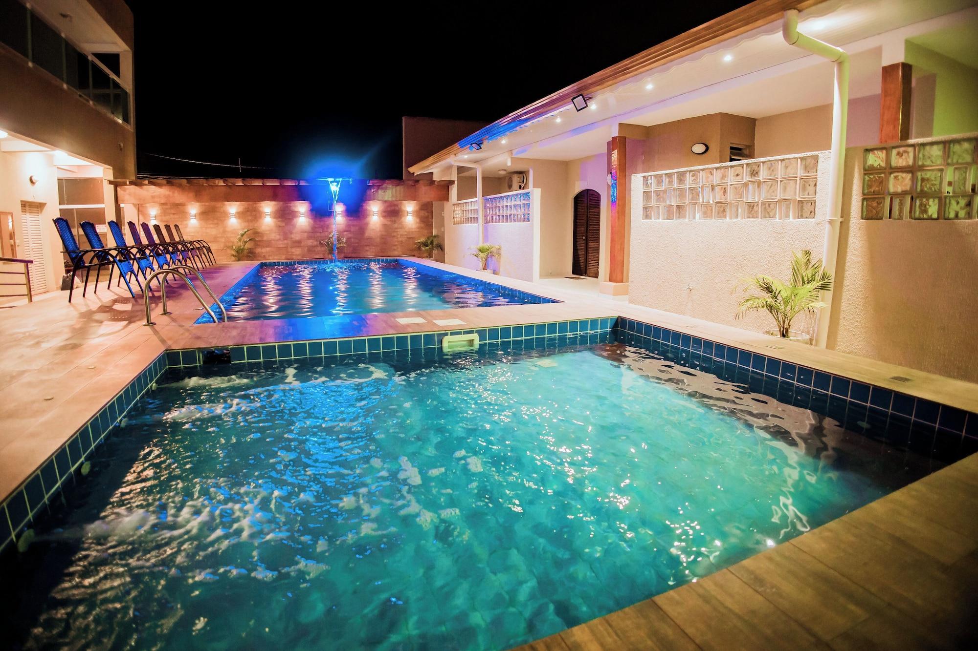 Vista Piscina Pousada Aurora Peruíbe