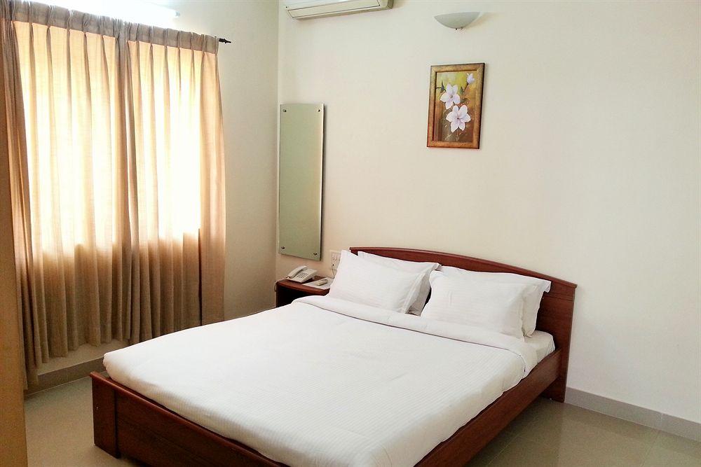 Habitación The Grand Serenity Apartment Hotel