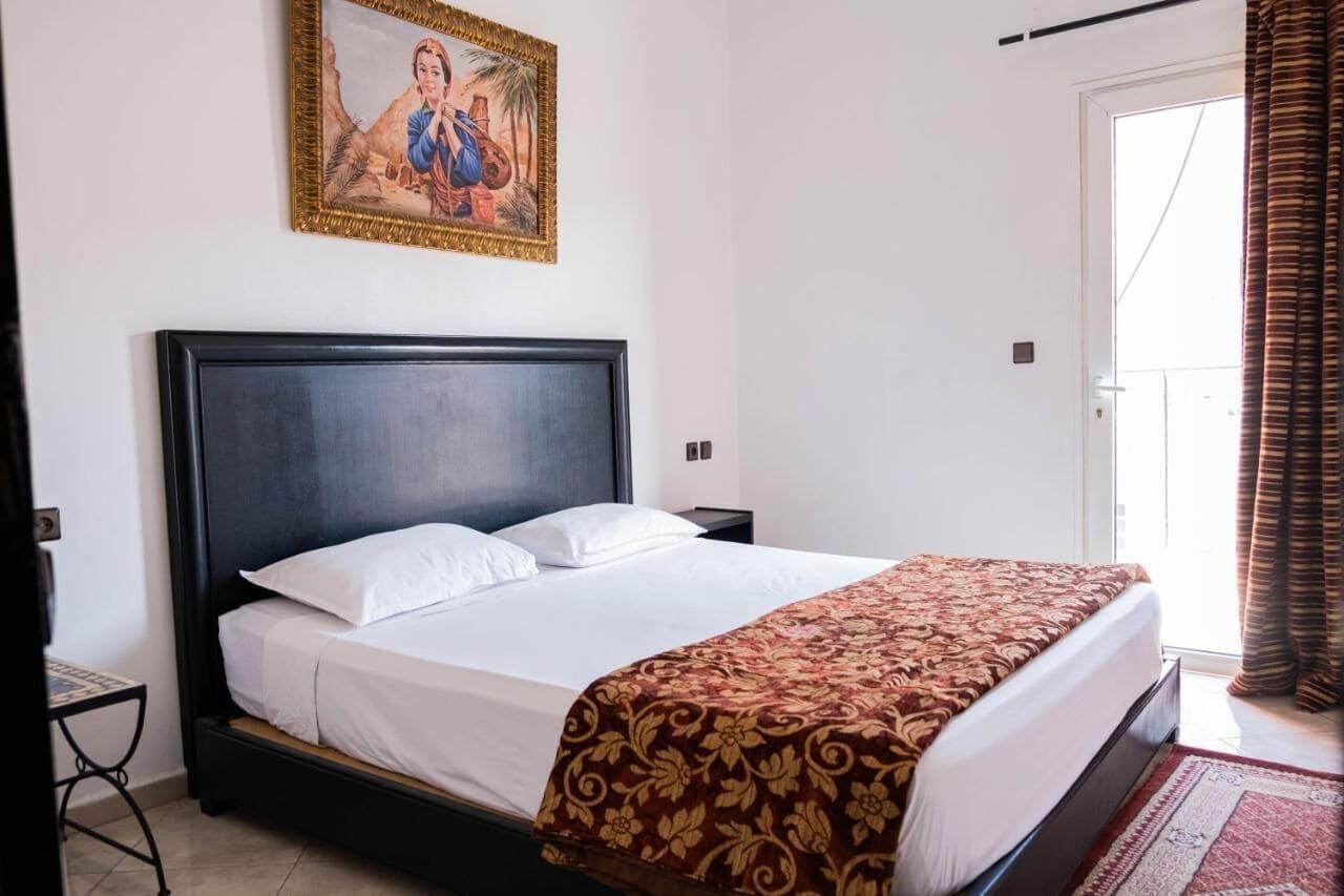 Quarto Hotel Appart Larabi