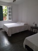 Alquiler Vacacional - 2-storey colonial mansion 400 m from the beach. Large balcony, swimming pool, barbecue.