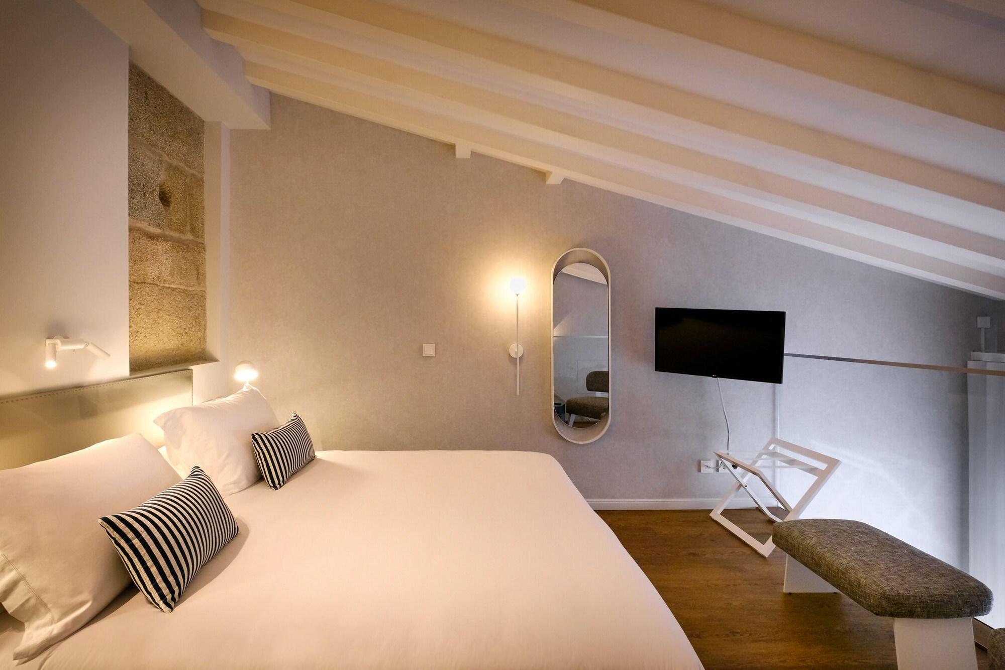 Habitación MouraSuites Hotel
