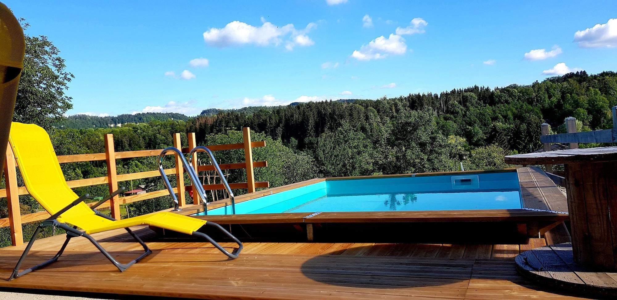 Vista Piscina Chambres d'hôtes Cascades du Hérisson