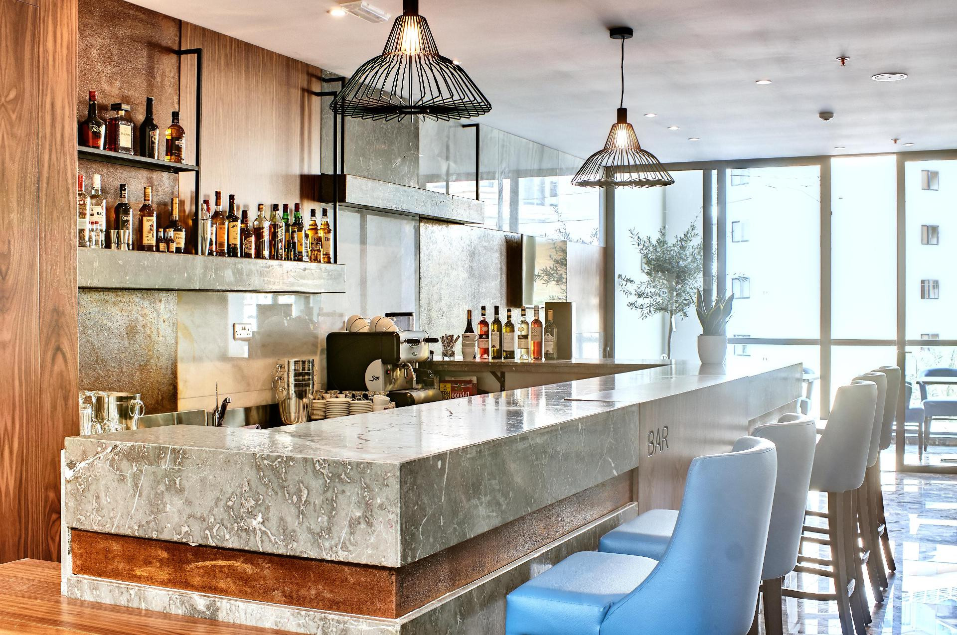 Bar/Salón The District Hotel