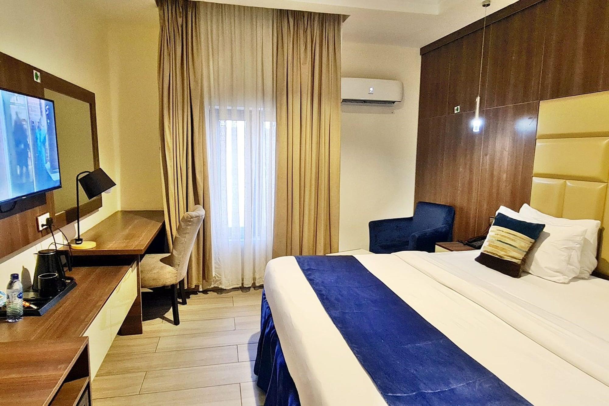 Habitación Villa Toscana Hotel Asaba
