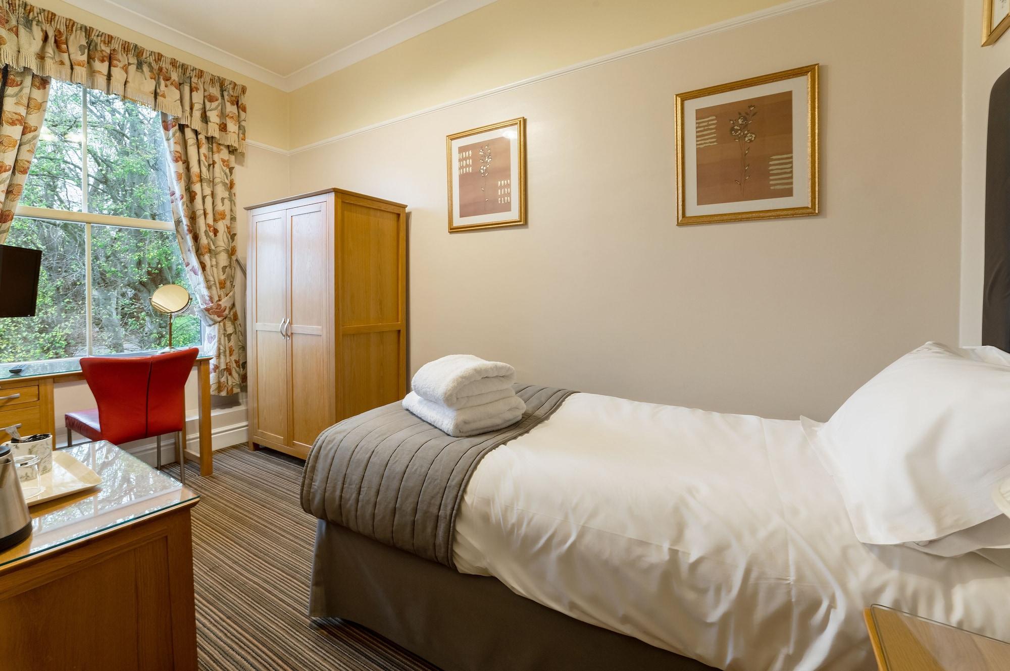 Habitación Charades Guest House