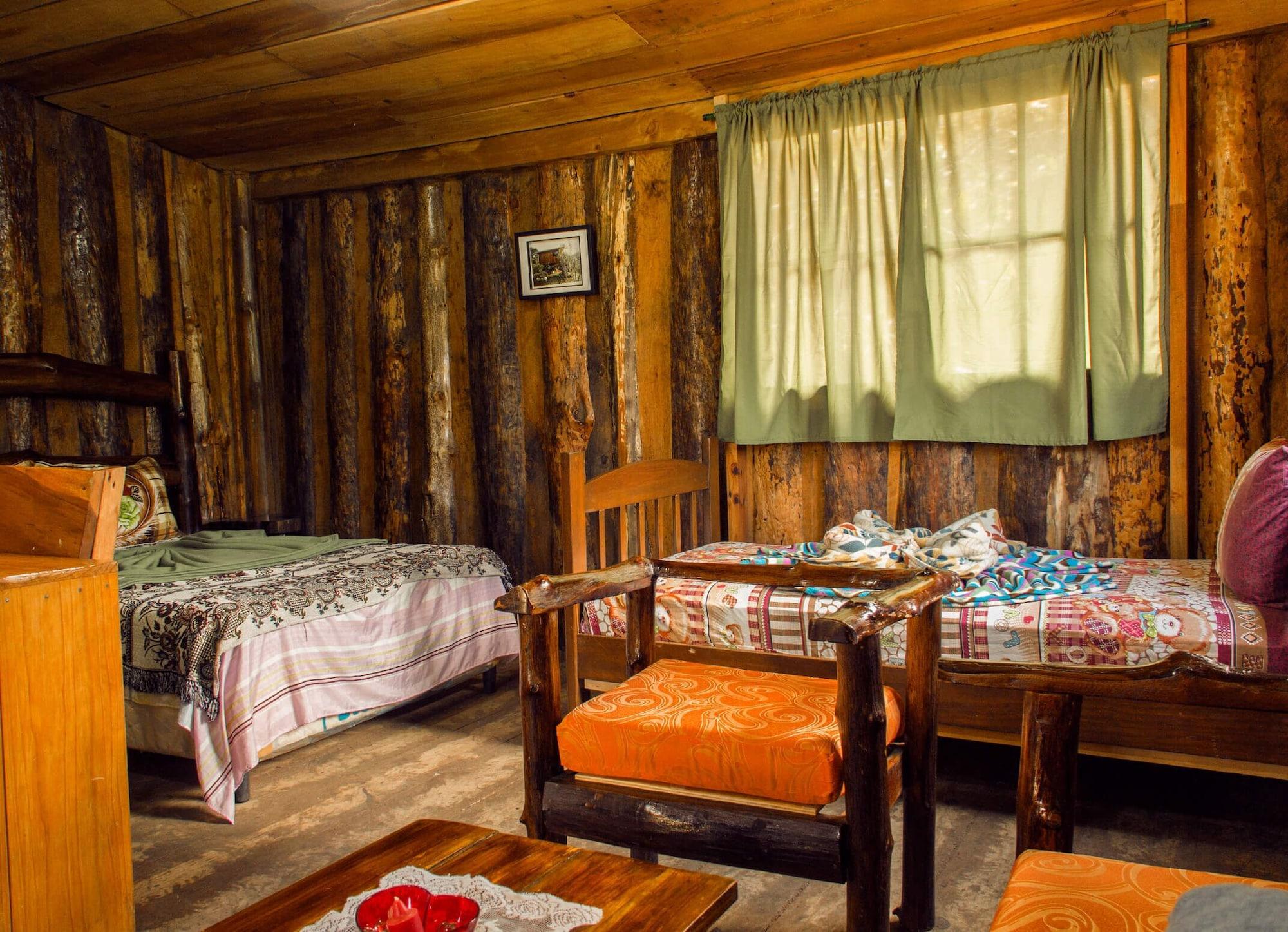 Habitación Cabañas Alla Arriba