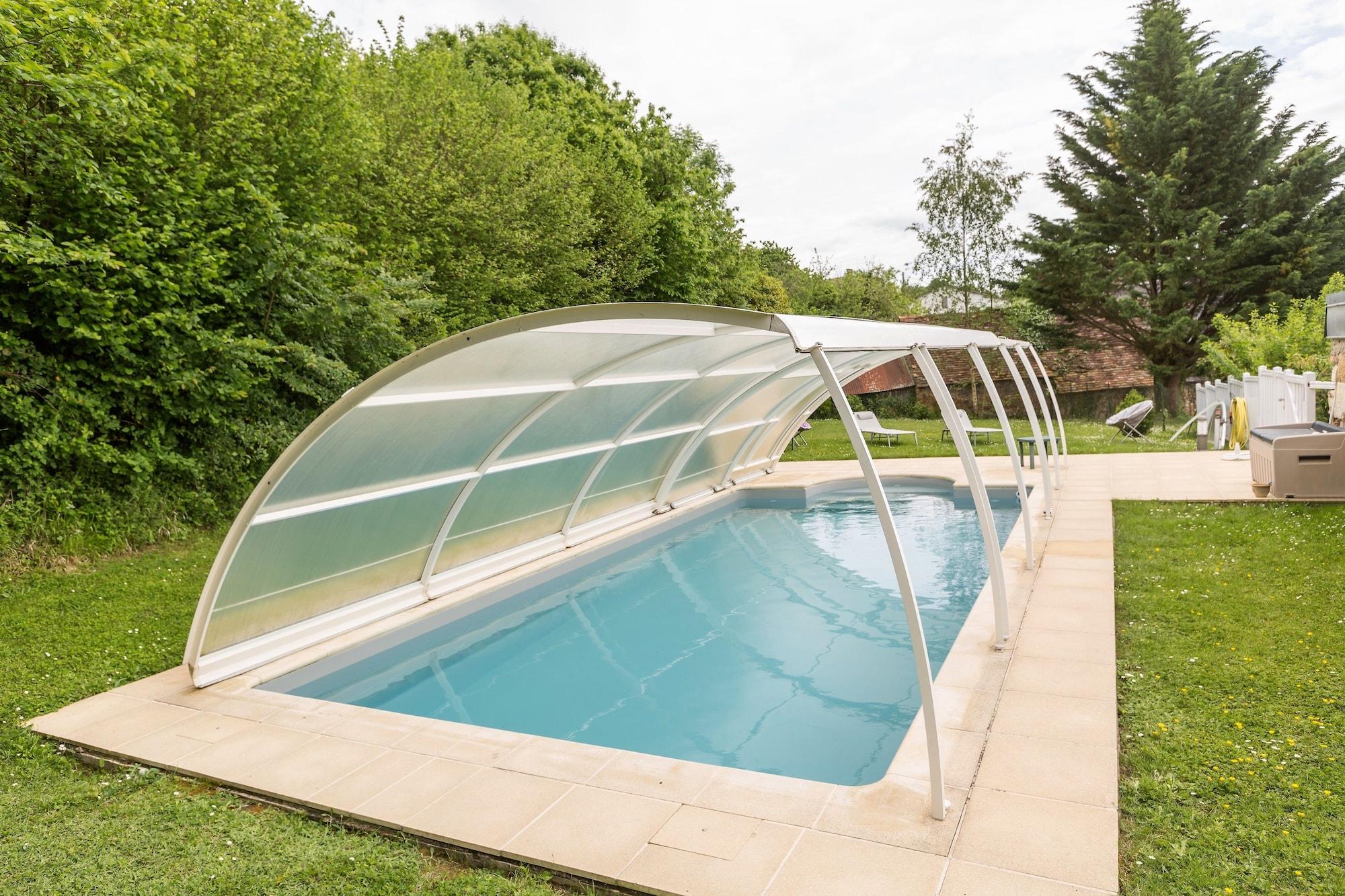 Vista Piscina Auberge du Cheval Blanc