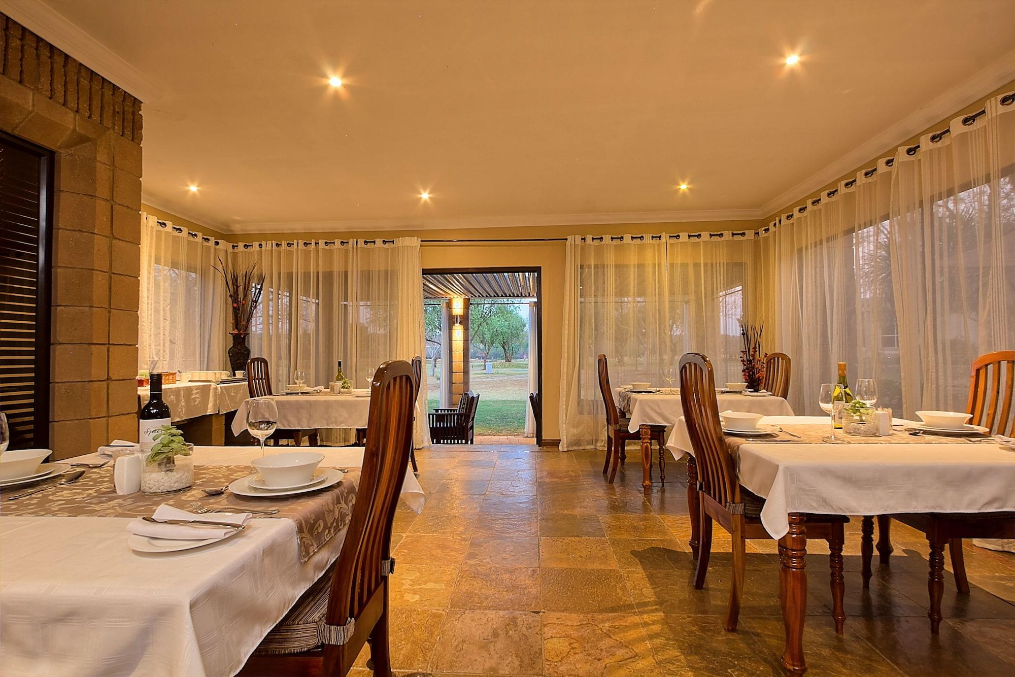 Restaurant Centurion Golf Suites Boca Walk