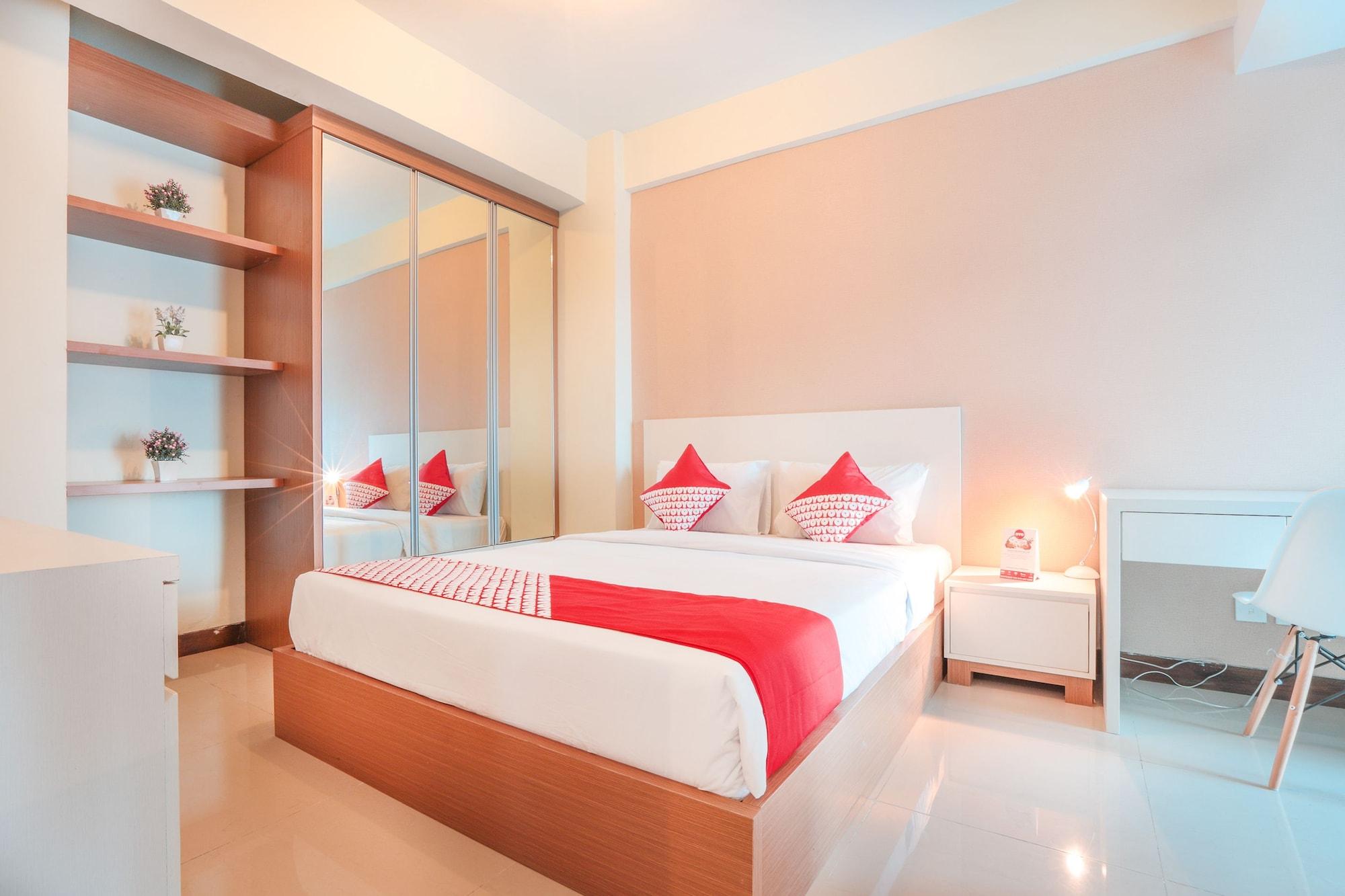 Habitación OYO Flagship 755 Appartel Grand Dhika City