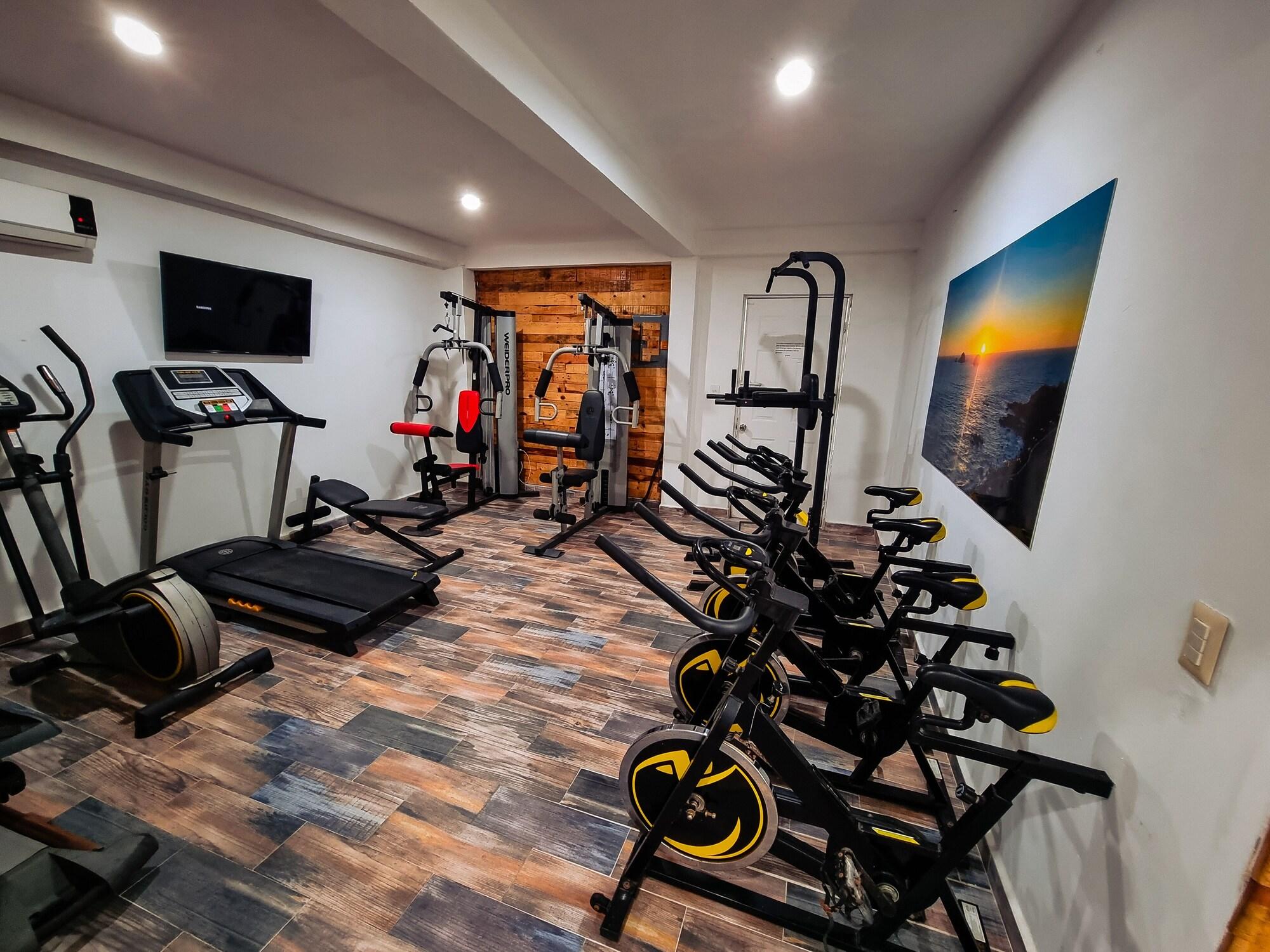 Gimnasio Hostal la casa de madera