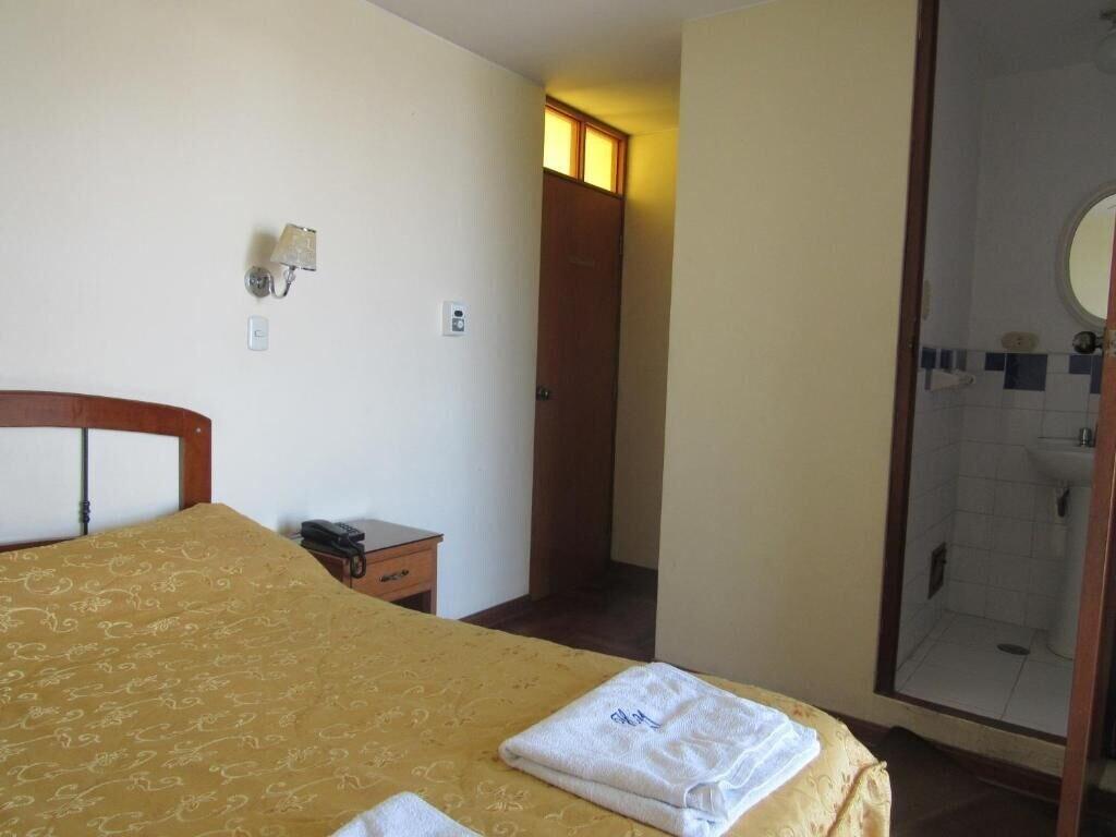 Habitación Hostal Siglo 21