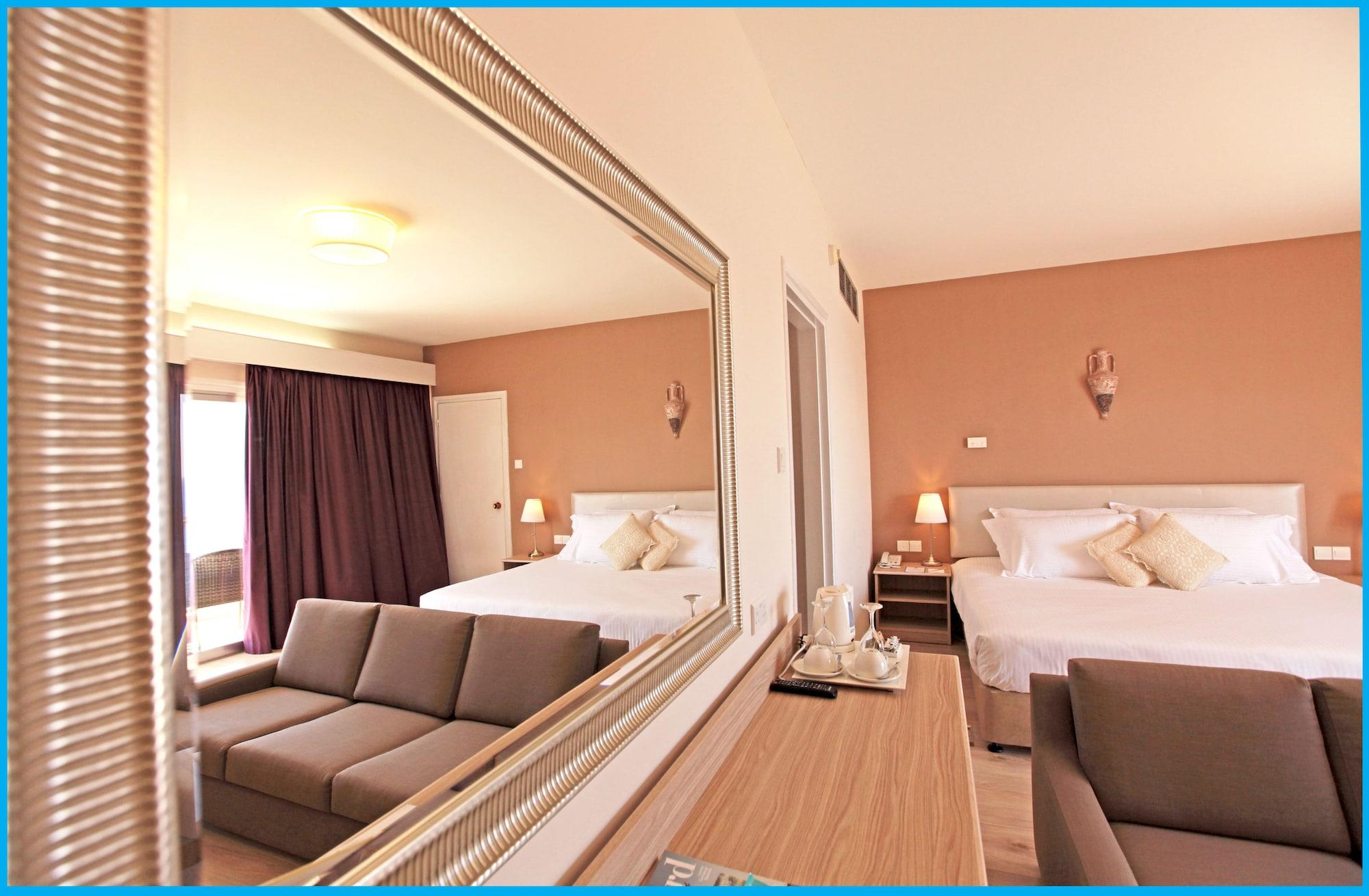Habitación Poseidonia Beach Hotel