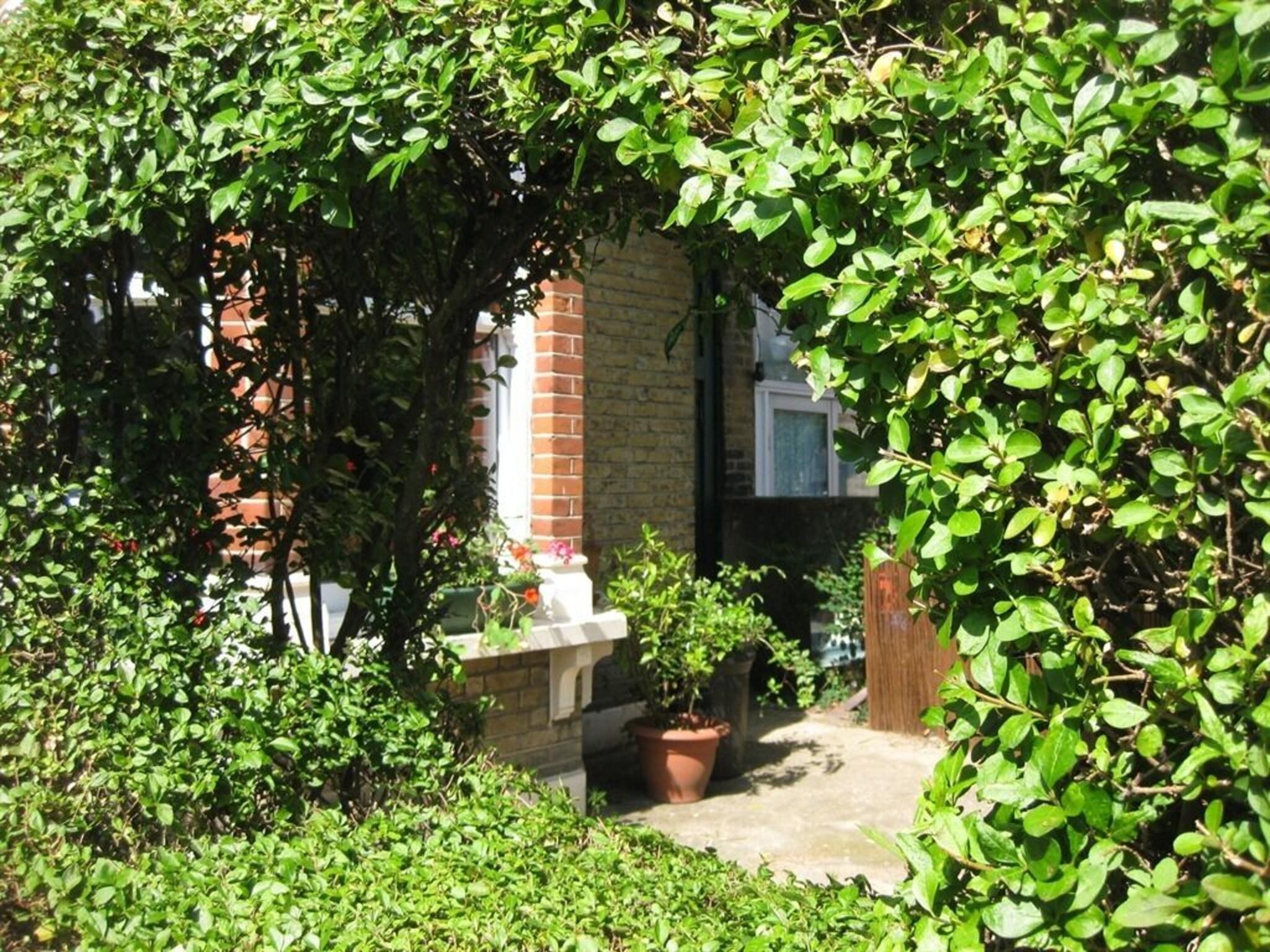 Área de recreação Grove Guest House