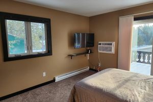 Alquiler Vacacional - 3-bedroom house in lovely Side Lake with AC and fitness room, close to Trails