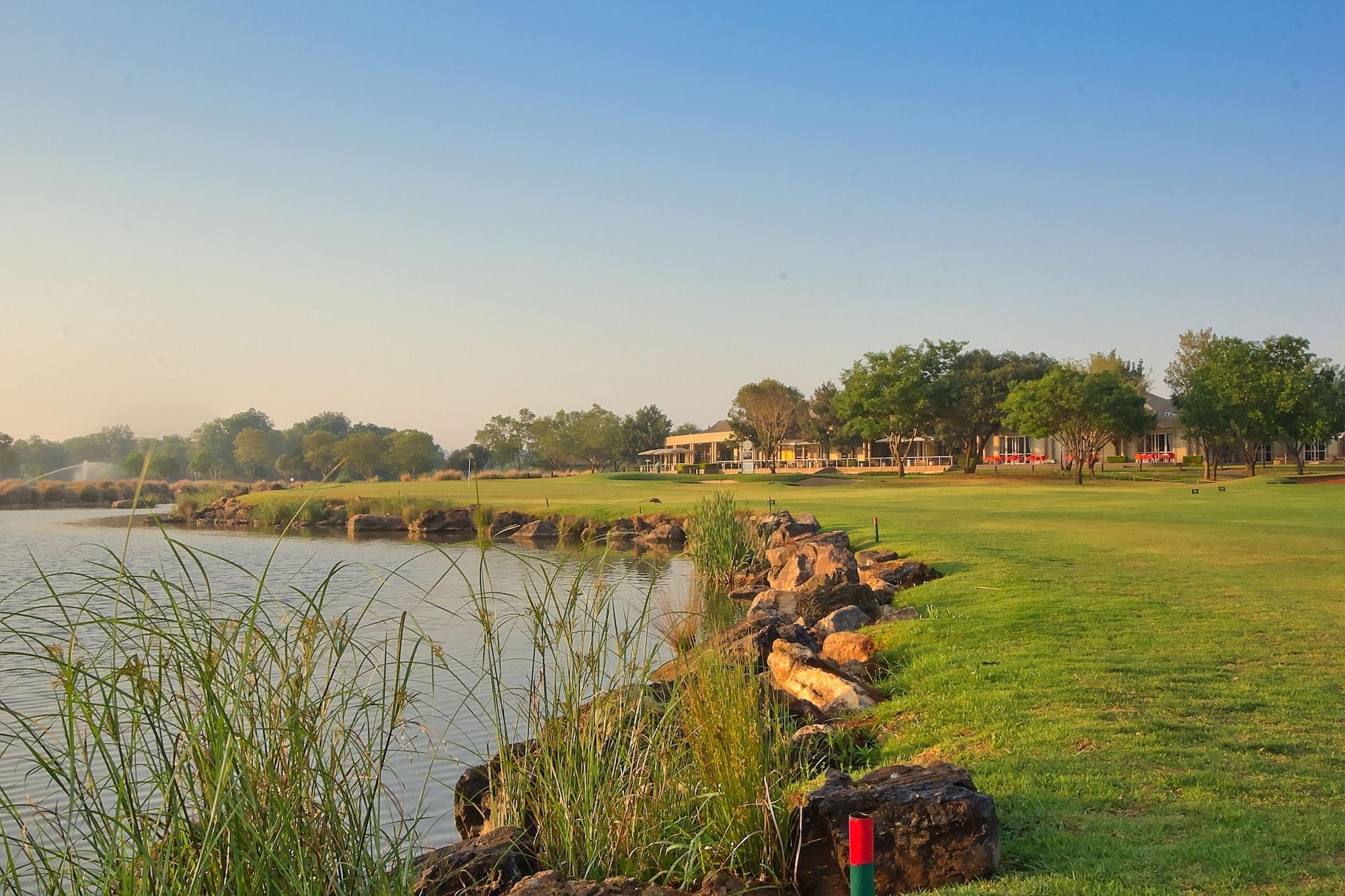 Campo de Golf Centurion Golf Suites Boca Walk