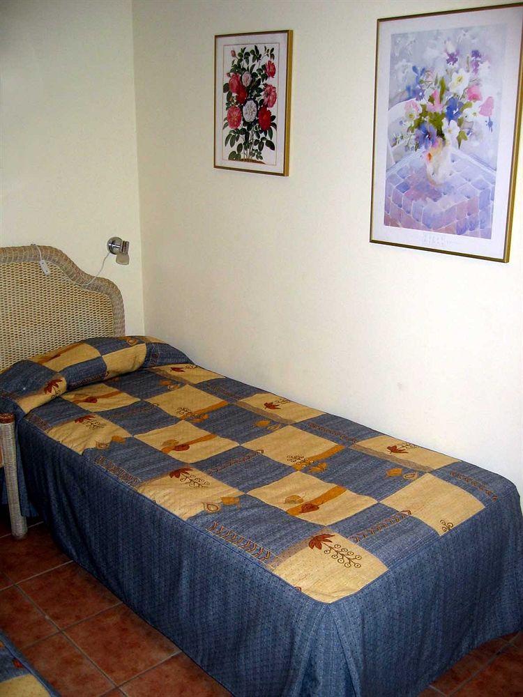 Habitación Apartamentos VIP Nogal