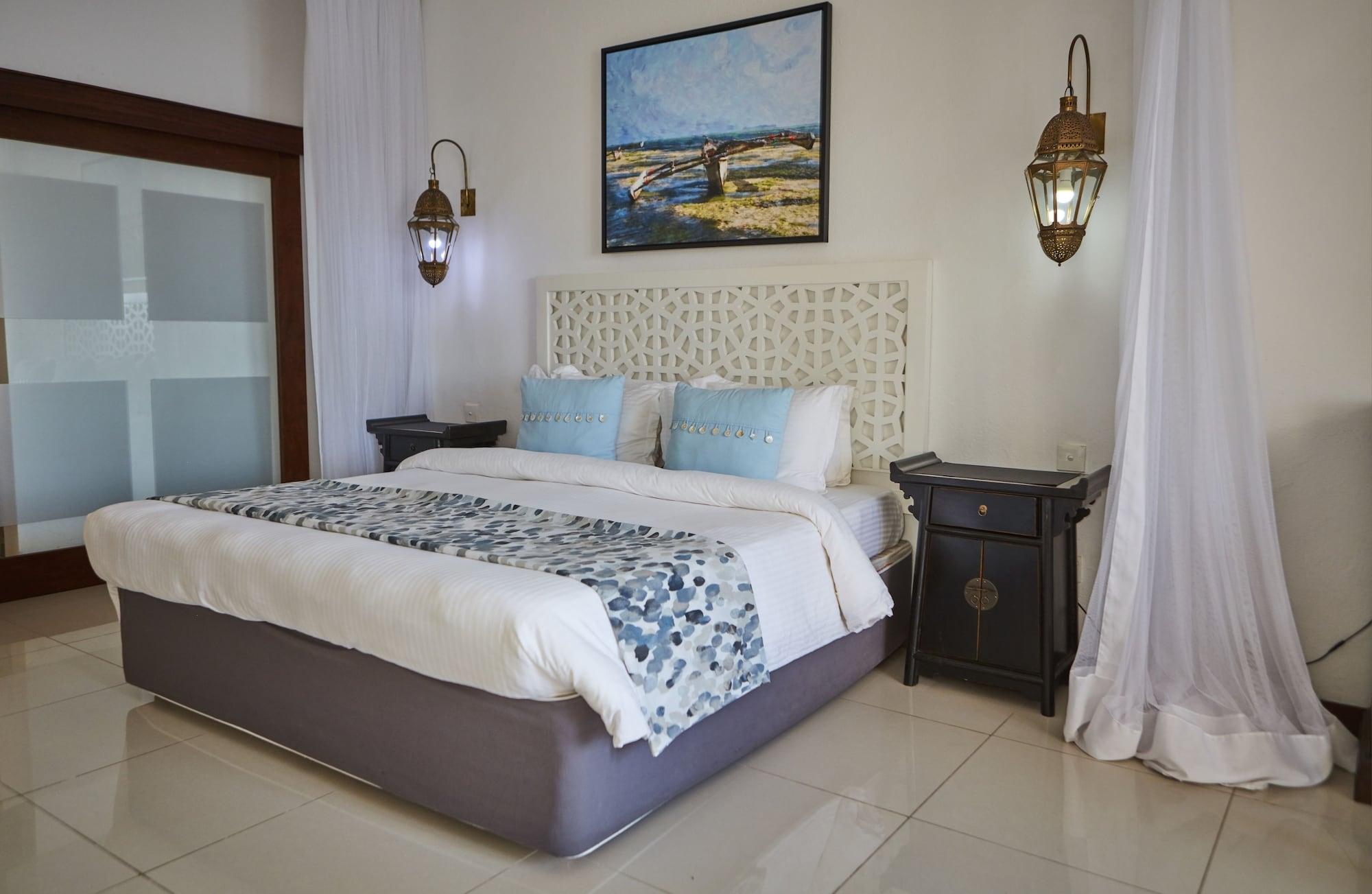 Habitación Tamarind Village Apartments