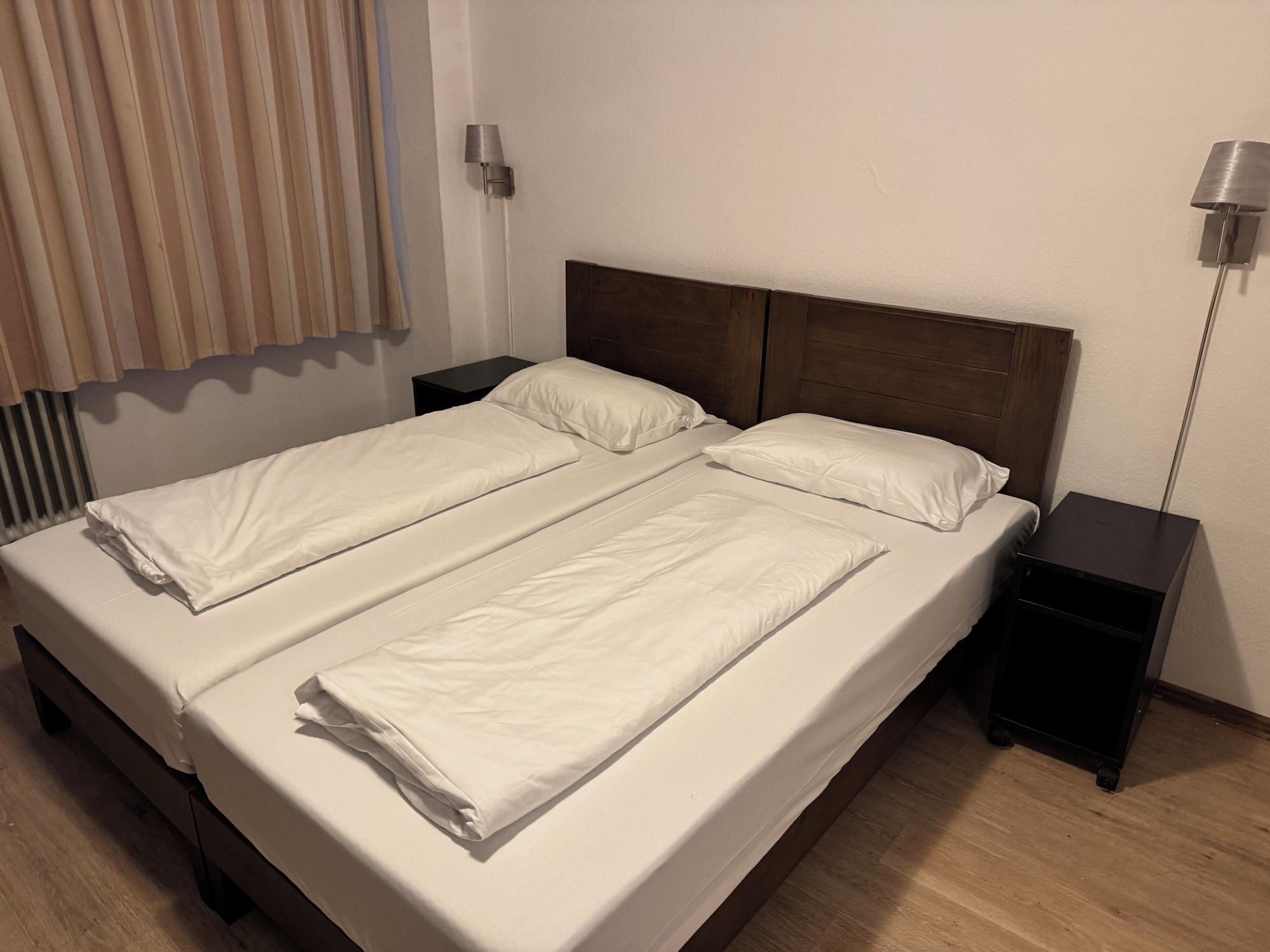 Habitación Pension Alpha