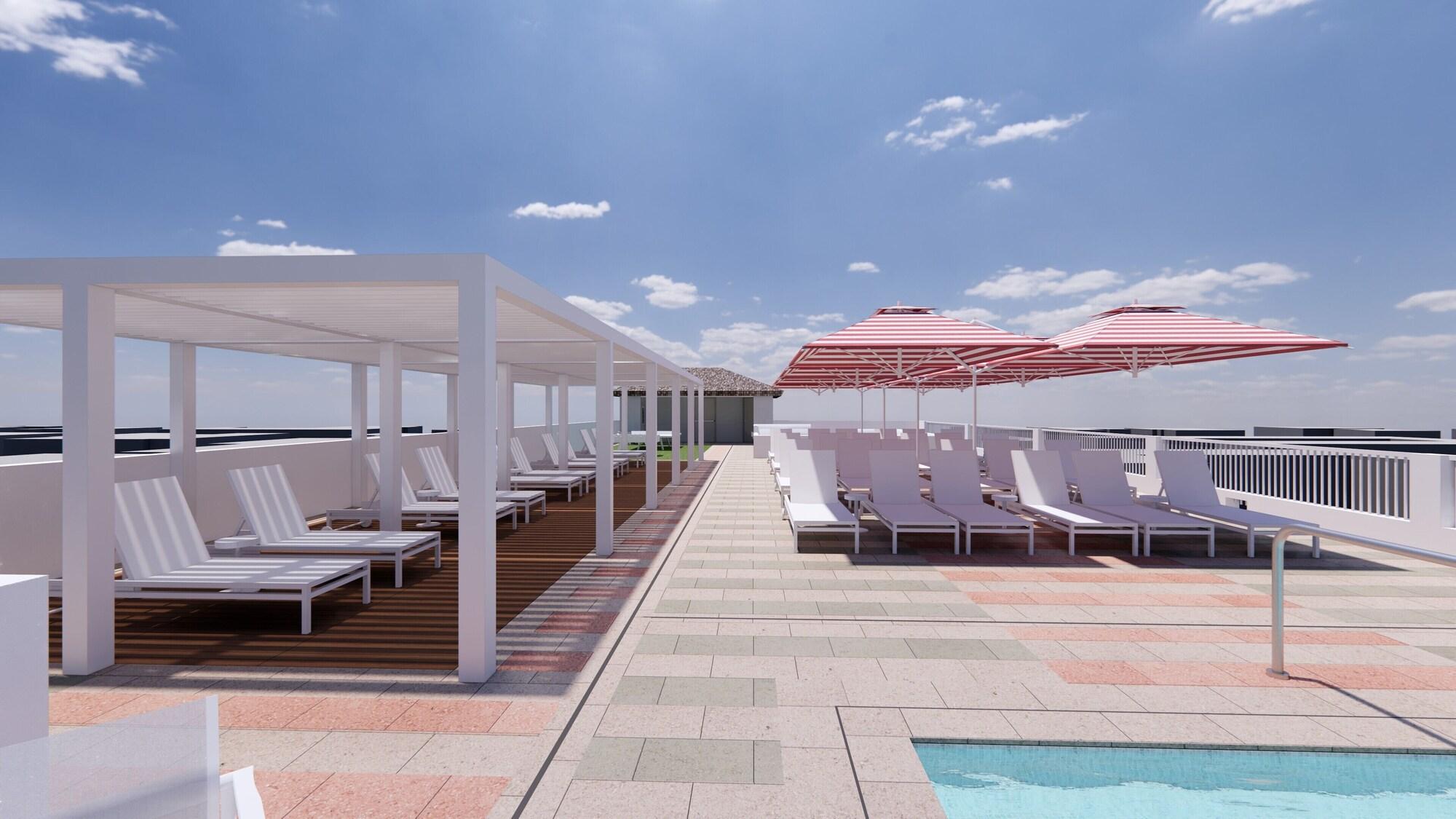 Vista Piscina Olde Naples Hotel