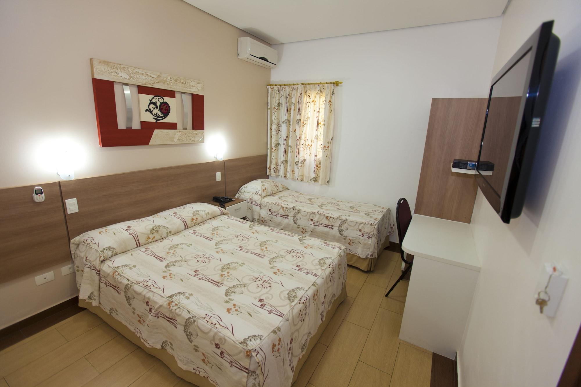 Habitación Oly Plaza Hotel