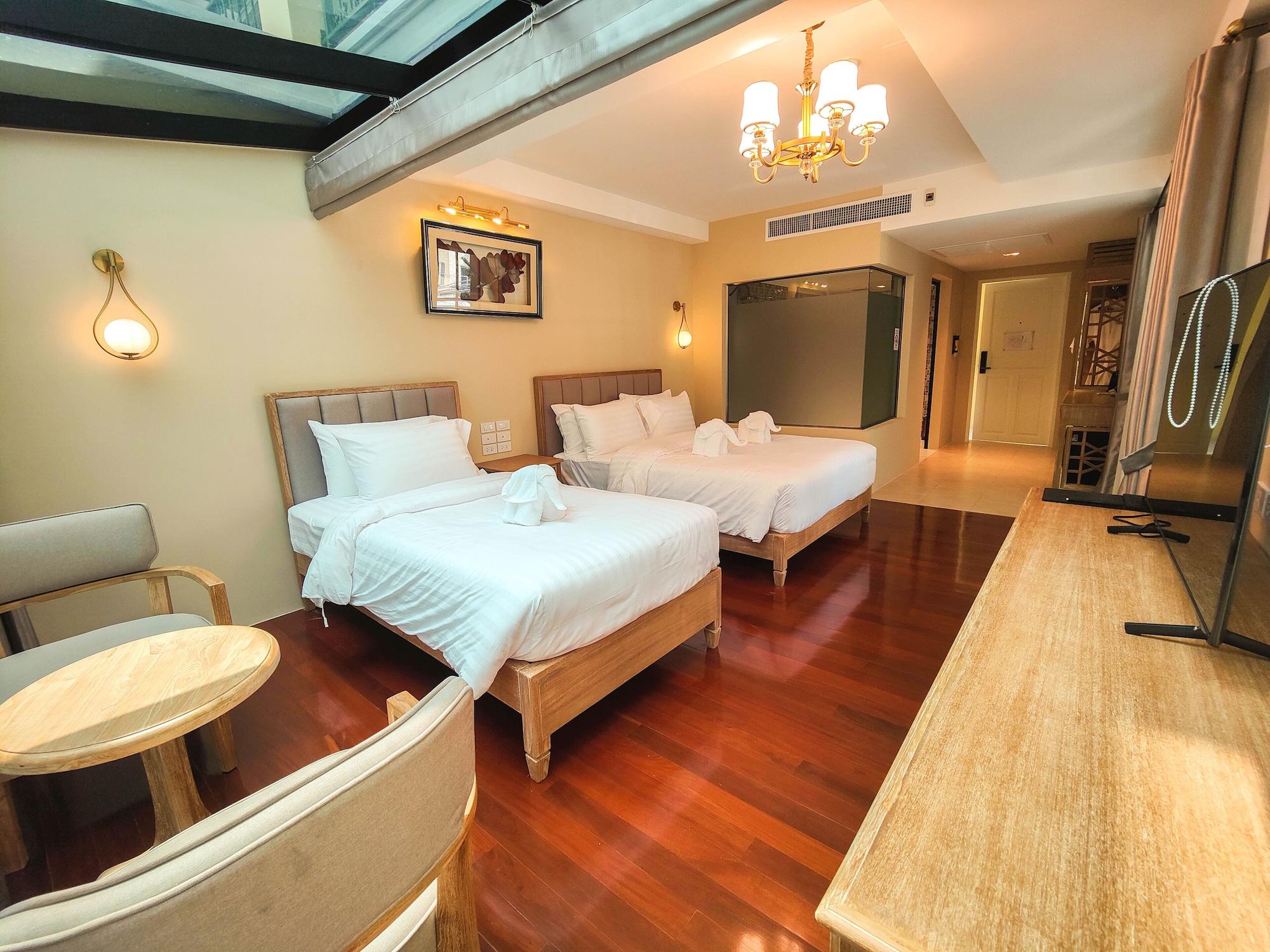 Habitación siri grand bangkok hotel