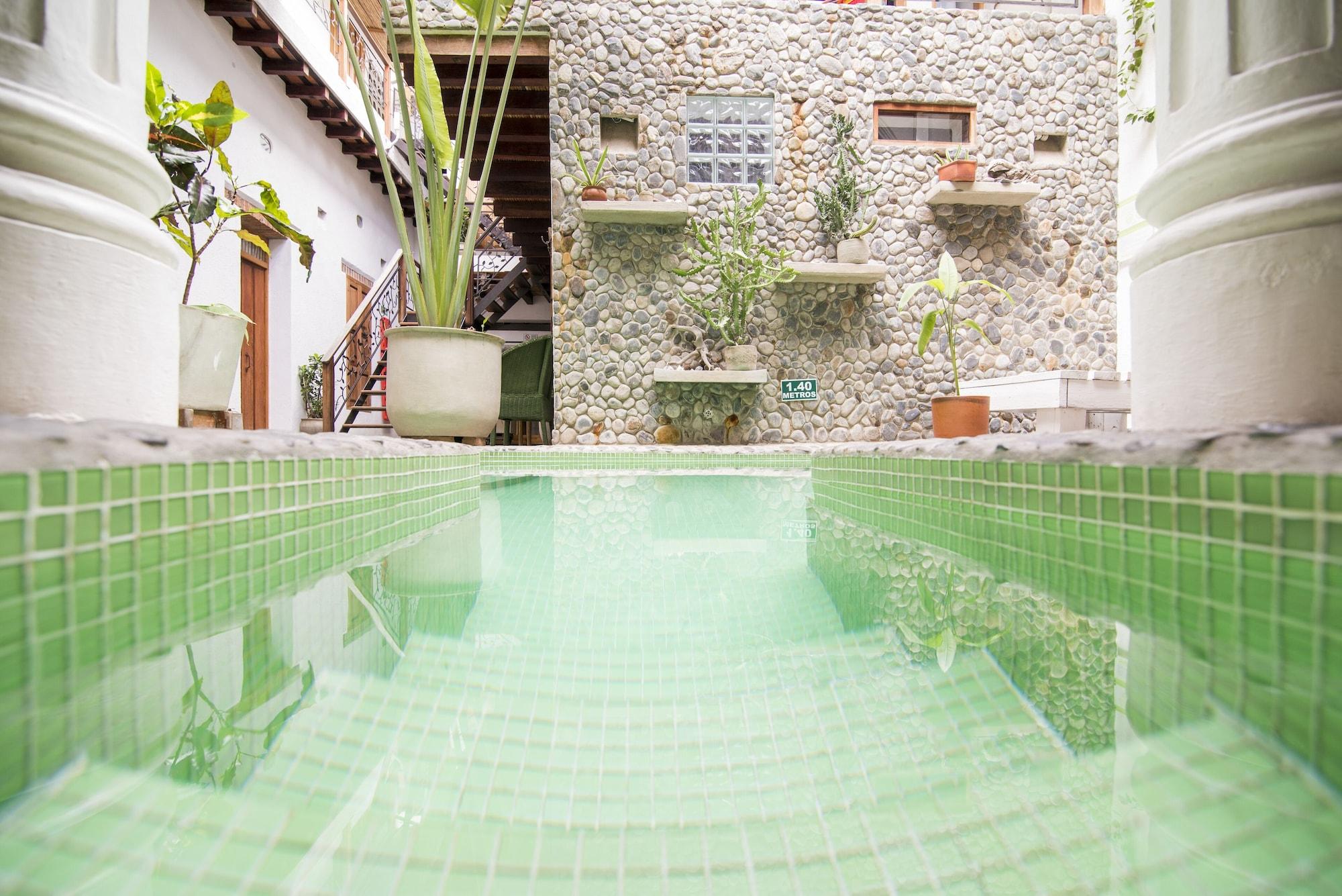 Vista Piscina Casa Verde Hotel