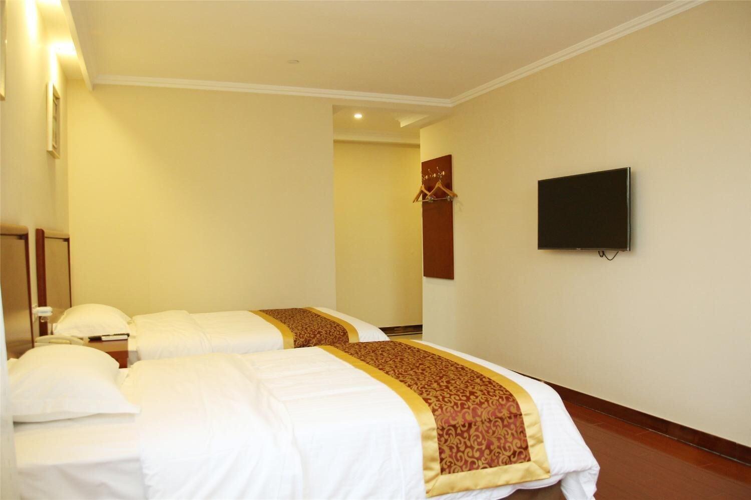 Habitación GreenTree Inn Taizhou East Meilan Road University Town Hotel