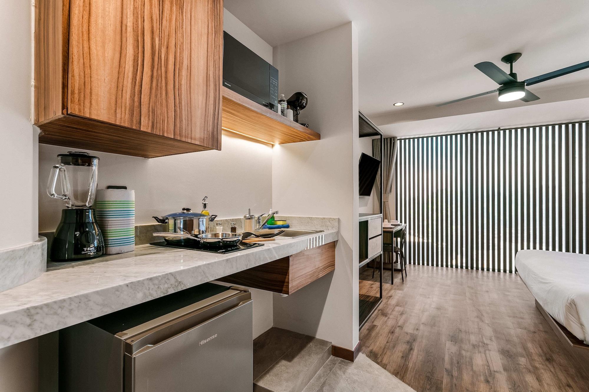 Equipamiento de Habitación Suites Álamos by Homirent