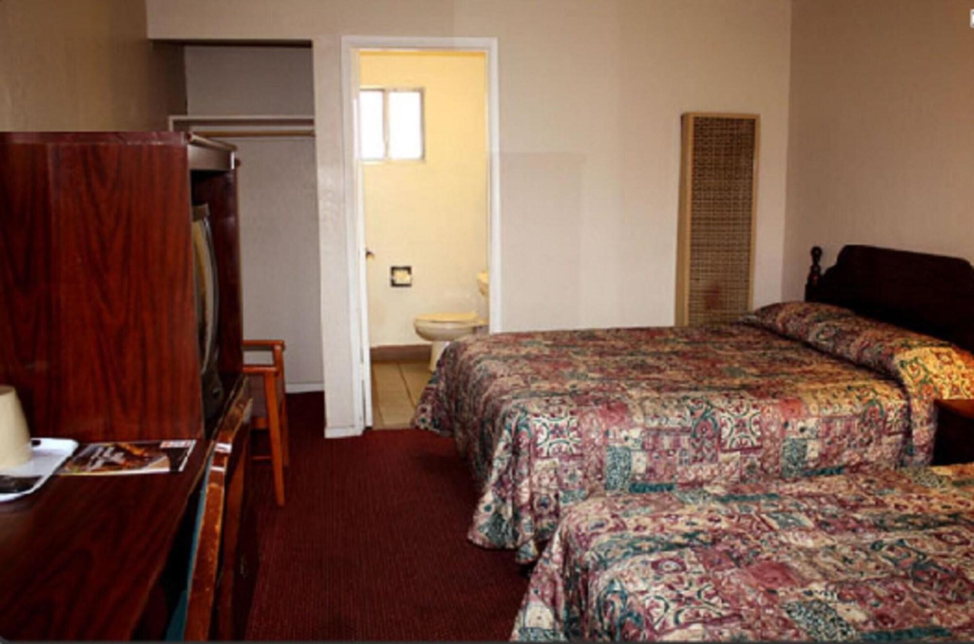 Habitación Sunset Inn and Suites