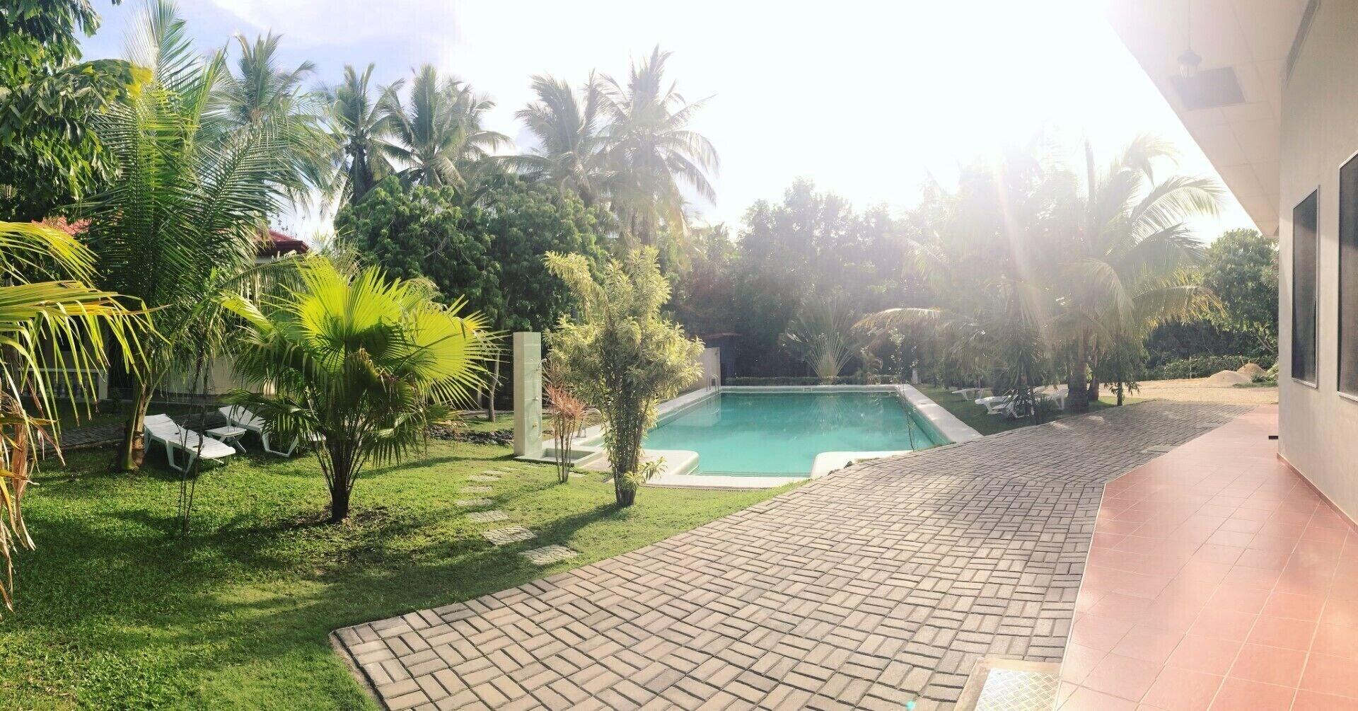 Vista Piscina Meili Beach Resort