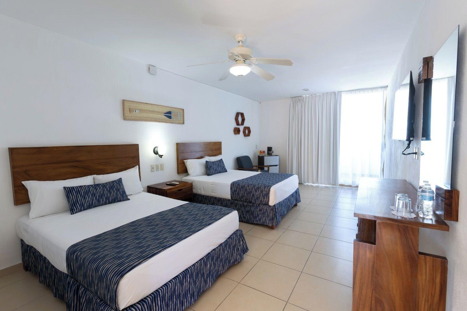 Habitación Costa Alegre Hotel & Suites