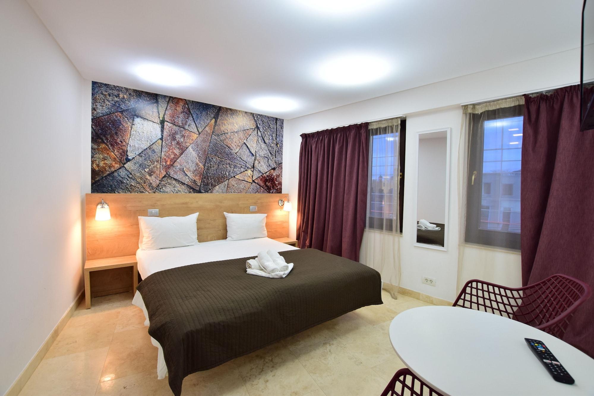 Habitación Dacia Residence Apartments