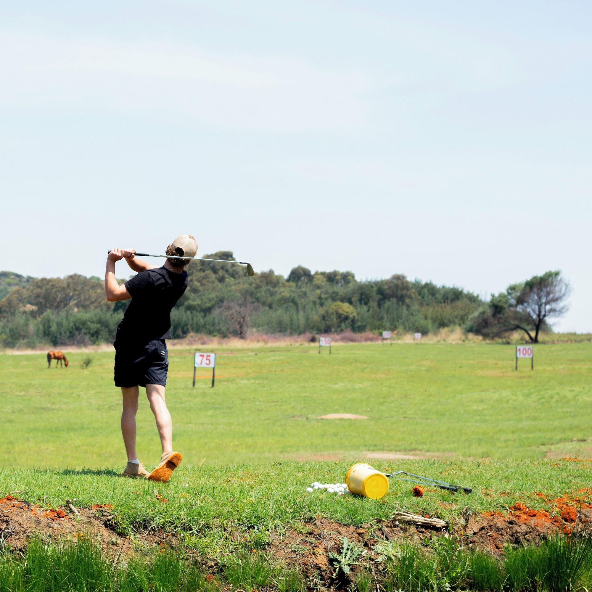 Campo de Golf Riverman Cabin Country Lodge