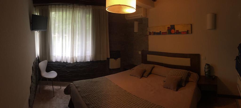 Habitación Sonidos del Bosque Apart Hotel