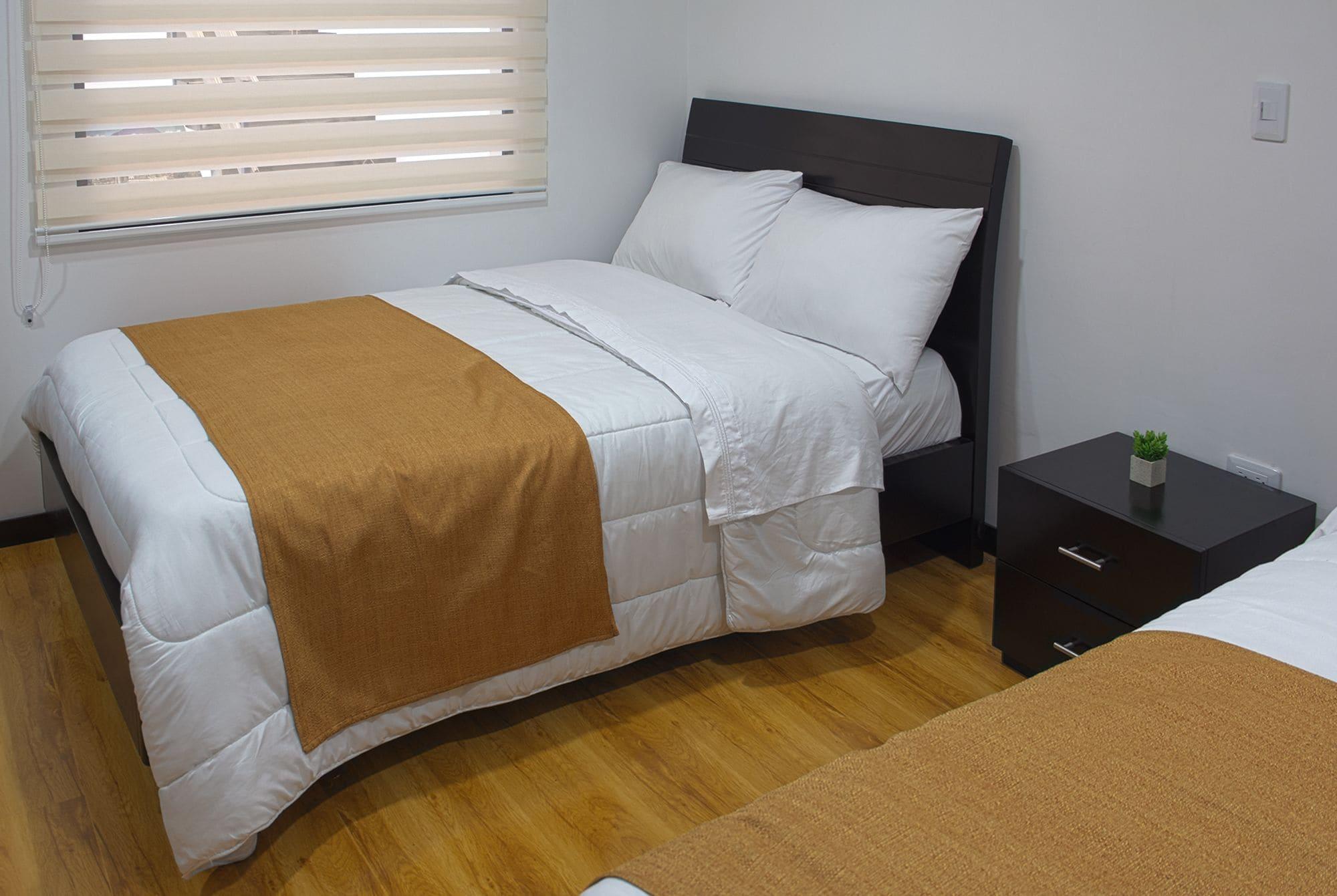 Habitación Hotel Care International