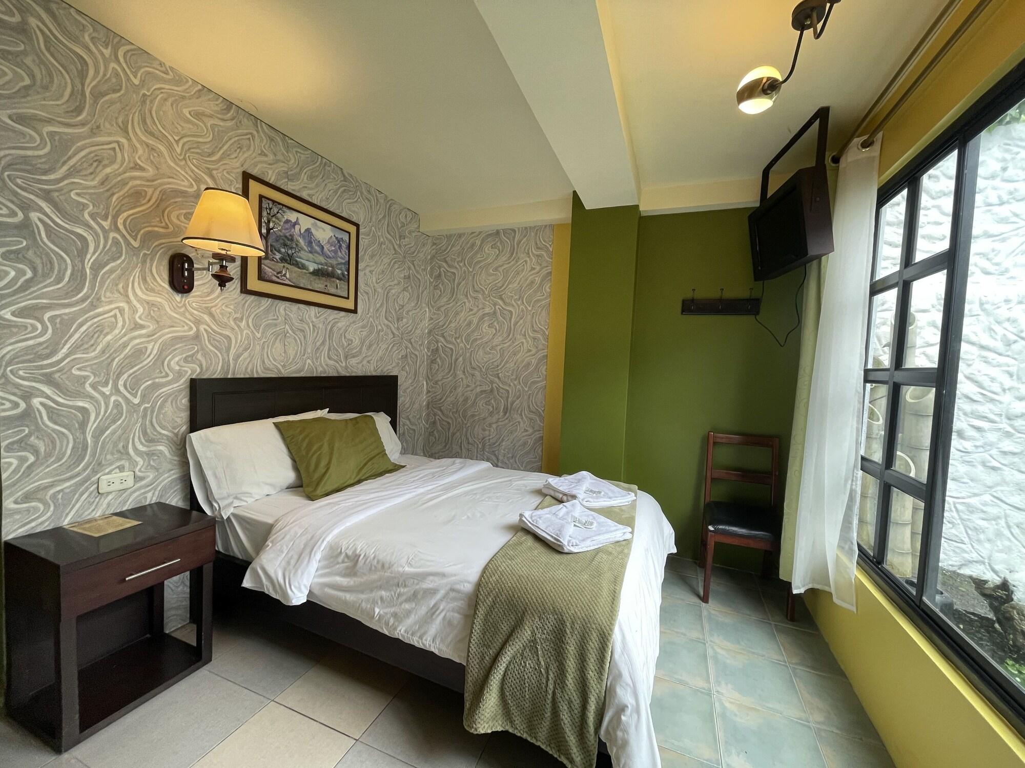 Habitación Hotel La Chimenea Casa De Piedad