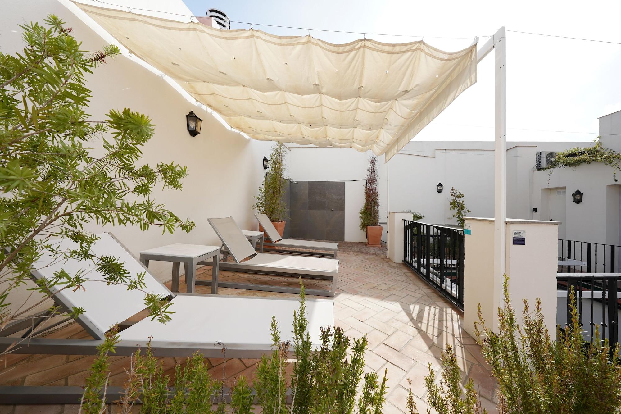 Varios Numa Seville Alegre
