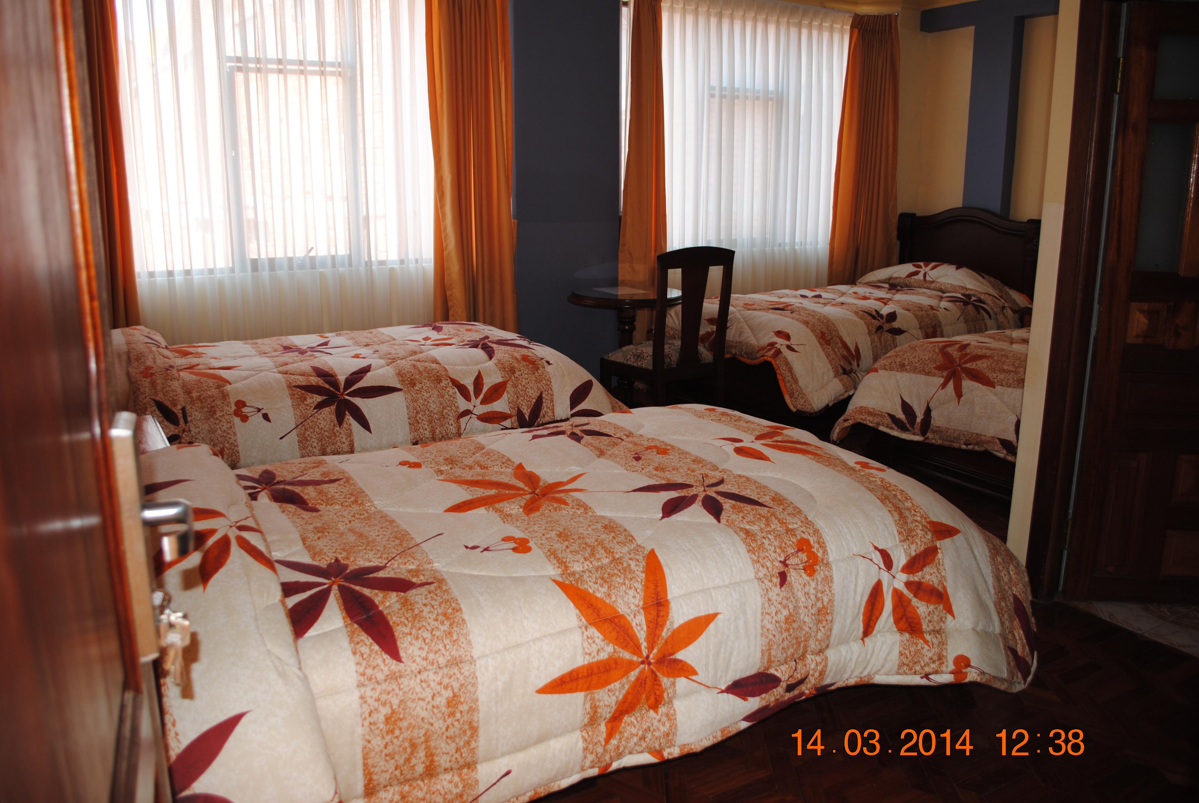 Quarto Hotel Perla del Lago