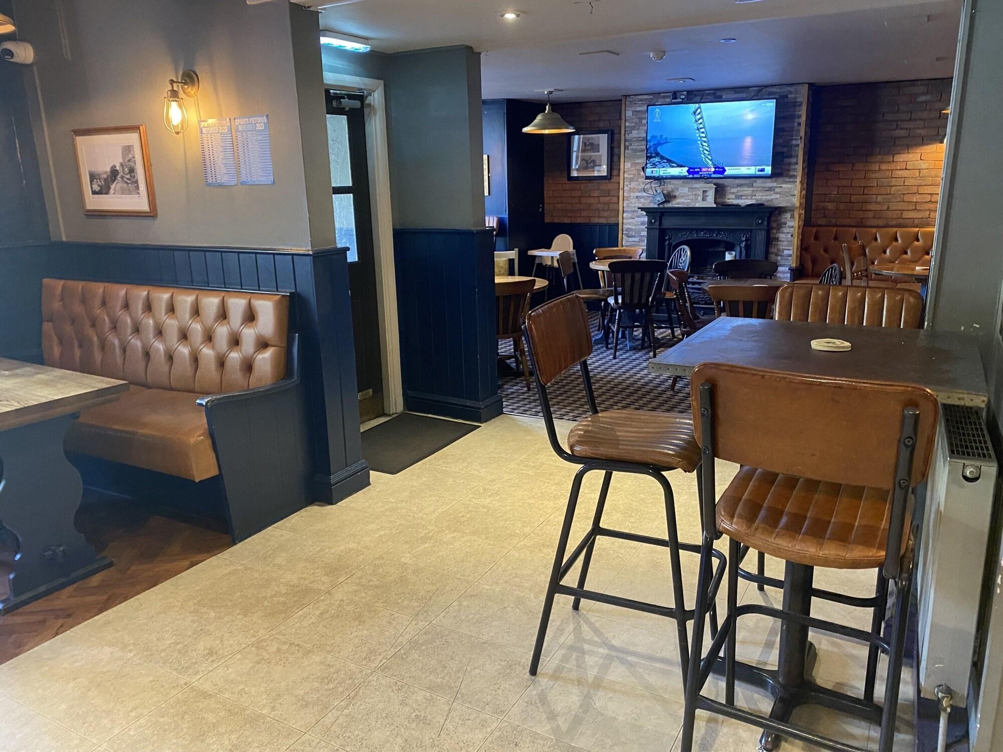 Bar/Salón Turf Hotel