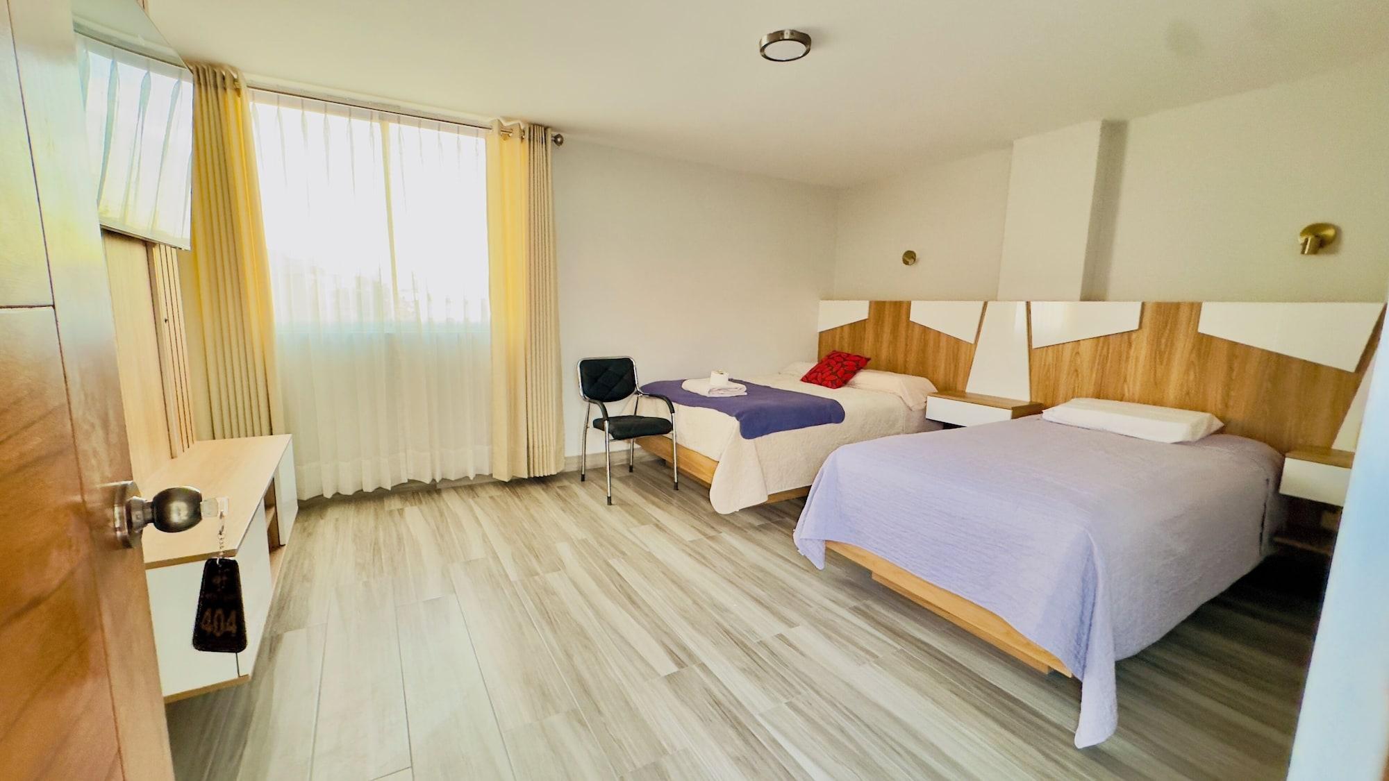 Habitación hotel florez boutique