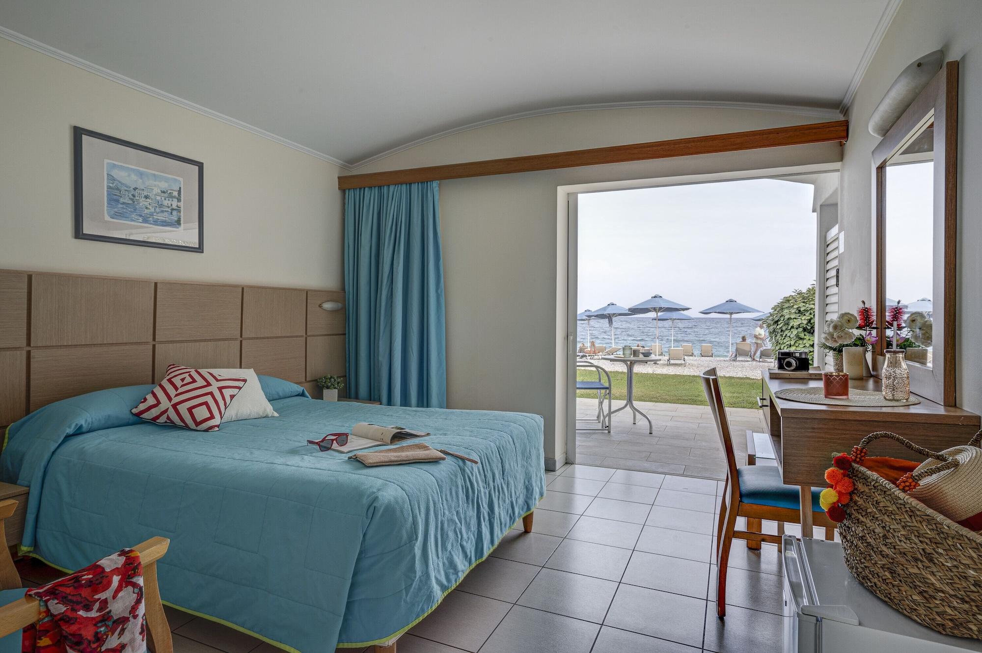 Habitación Comer Kinetta Beach