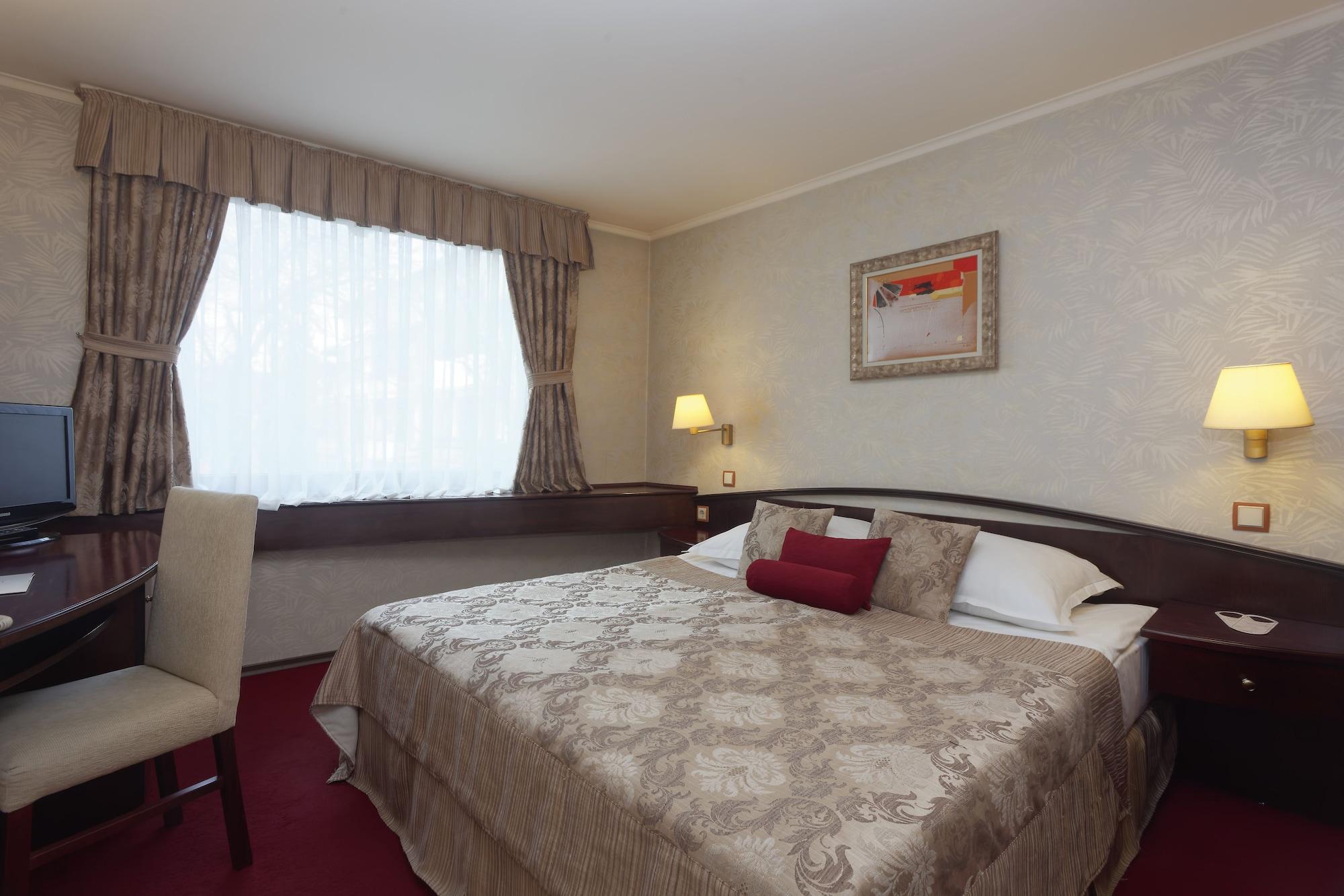 Habitación Hotel Capitol