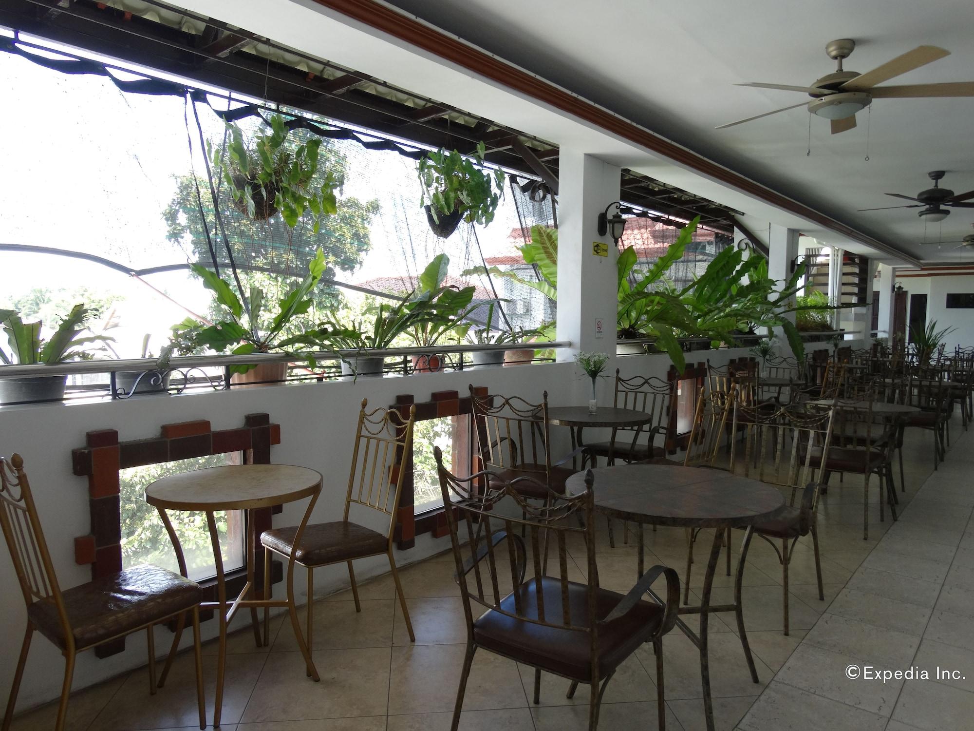 Restaurant Ecoland Suites & Inn