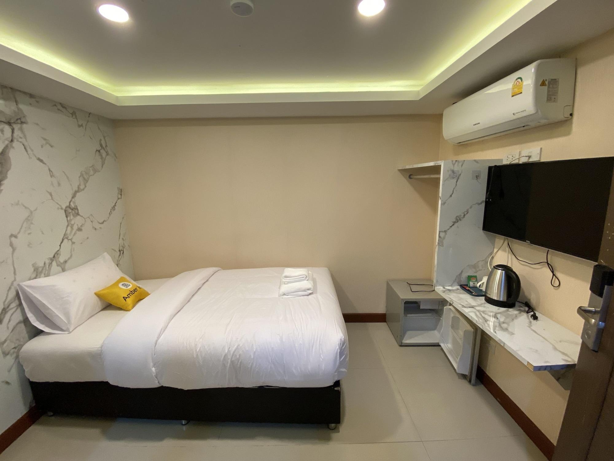 Habitación Amber Inn